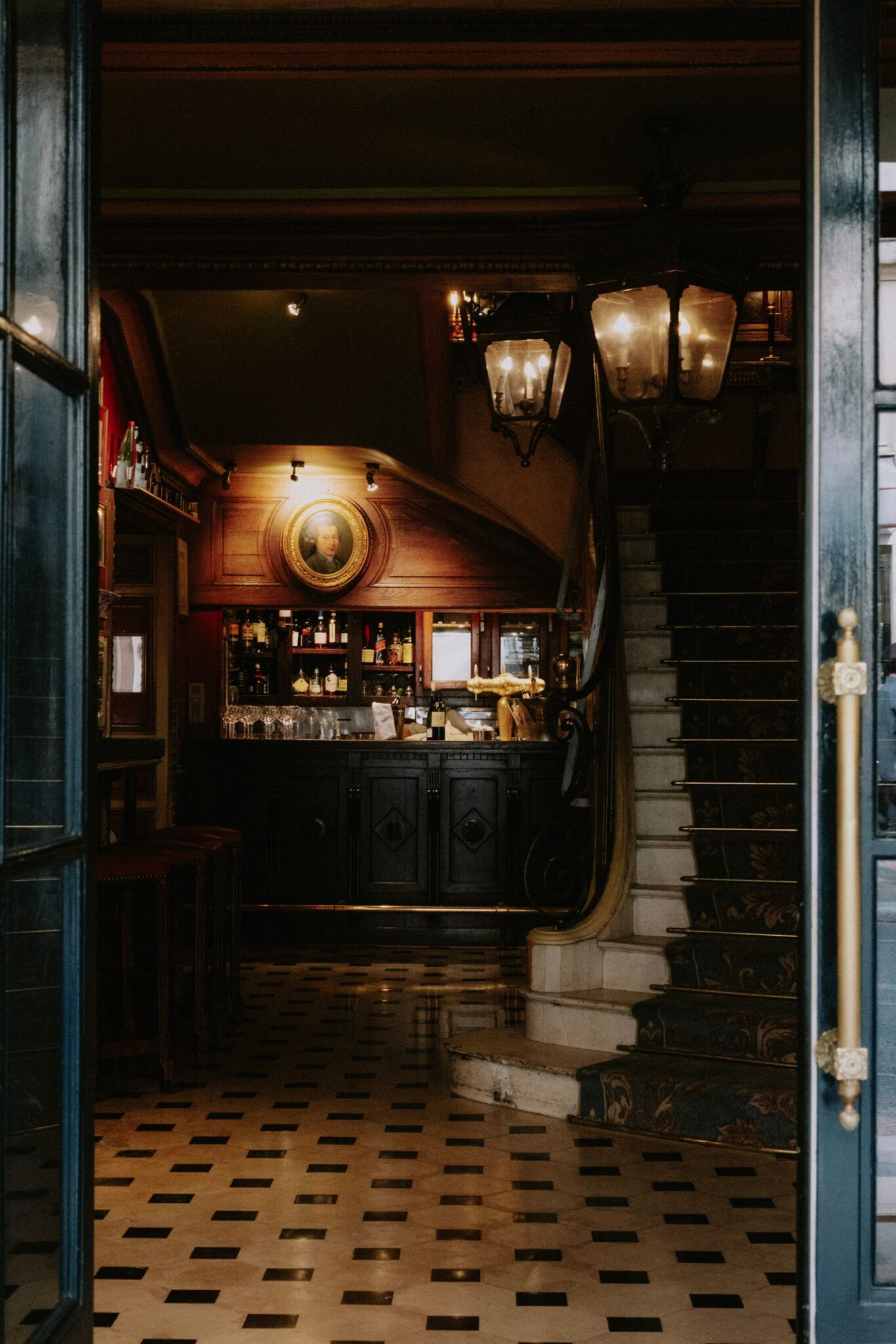 Warm classic bar interior with staircase
