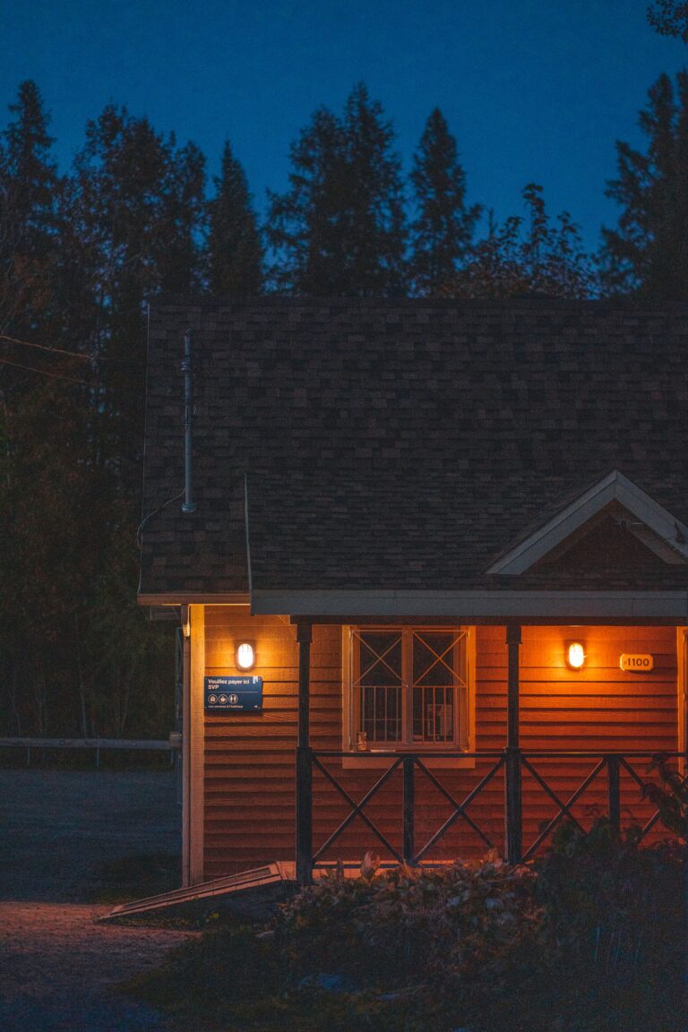 Charming cottage porch glowing at twilight